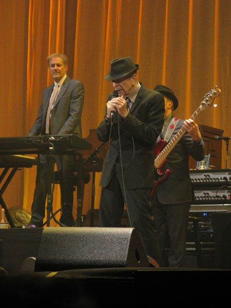 Neil Larsen looks on