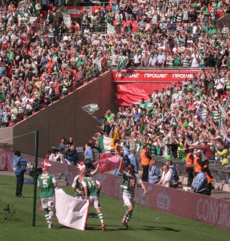The players celebrate before delirious fans.