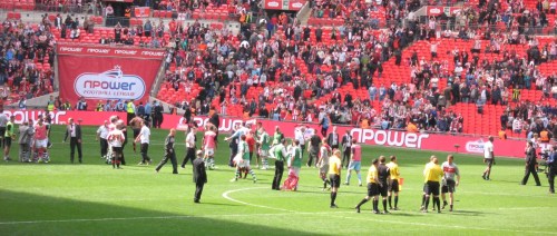 Somehow Yeovil hang on to secure their most important victory in their 113 year history and the rival players shake hands at the end of a competitive game.