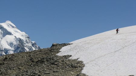 Crossing the snowfield to access the Col beneath Schwalmere.